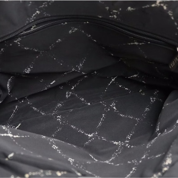 CHANEL Black Quilted Travel Bag with Diamond Pattern - Picture 7 of 16